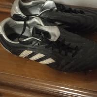 Scarpe nere-argentate Adidas sei tacchetti