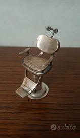 Piccola poltrona da dentista in argento 800