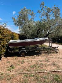 Barca motore e carrello