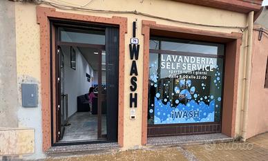 Attività con locale lavanderia self service