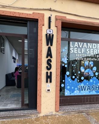 Attività con locale lavanderia self service
