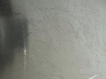 Due vassoi rotondi Alessi