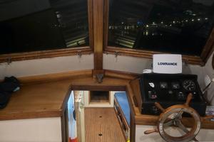 Barca a scafo disloccante di 9,90m