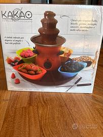 Fontana di cioccolato KAKAO con ciotole colorate