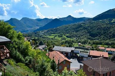 Bilocale con posto auto e giardino privato