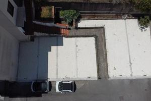 Posti auto e giardino
