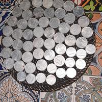 numerose monete da 10 lire circa 65 monete, e da 5