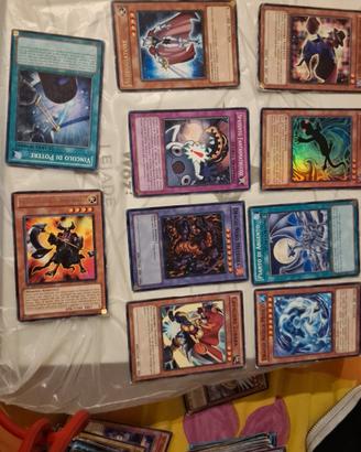 set 21 carte yu-gi-oh. rare/olografiche