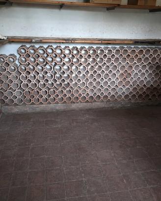 porta bottiglie in terracotta