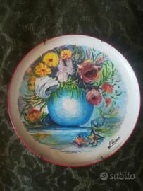 Piatti diversi, dipinti a mano