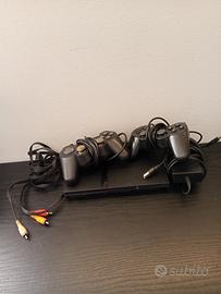 PS2 Slim + 2 Controller
