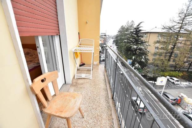 Via C. Augusta: Trilocale con balcone