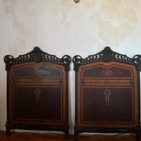 Letto antico in ferro decorato