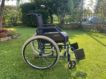 Carrozzina pieghevole