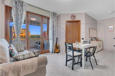 BILOCALE CON TERRAZZINO CANTINA E BOX