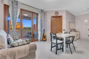 BILOCALE CON TERRAZZINO CANTINA E BOX