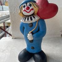 Pagliaccio  azzurro con palloncino cuore Thun