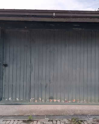 Porta basculante garage in ferro