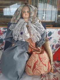 Bambola  in terracotta