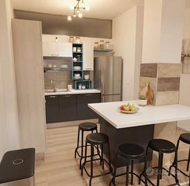 Cucina ad  angolo con isola  Creo - Lube
