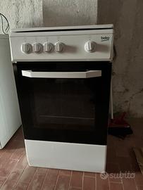 Cucina a libera installazione con 4 fuochi e forno