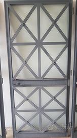 Portoni 1 o 2 ante ferro zincato e vetro.