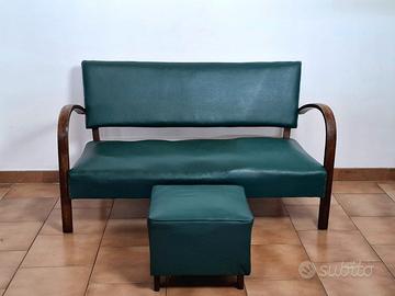 divano anni 50 ' in similpelle e legno.