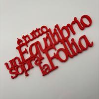 Scritta 3D È tutto un equilibrio sopra la follia