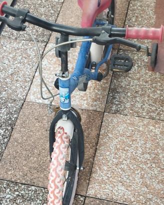 Bicicletta bimbo con rotelle