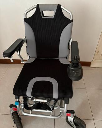 Sedia a rotelle elettrica