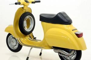 vespa special gialla cromo