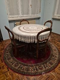 tavolo rotondo con sei sedie piu tappeto