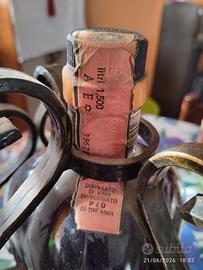 Liquore vintage con supporto in ferro  battuto 