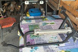 Portavalige laterale  givi  e piastra porta borsa