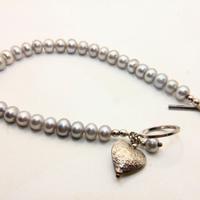 Splendido bracciale perle cuore argento