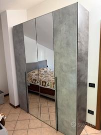 Camera da letto con armadio, 2 comodini e como’