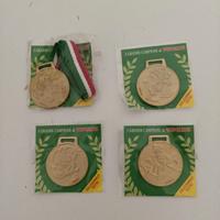 n.,4 medaglie gadget di topolino nuove e sigillate