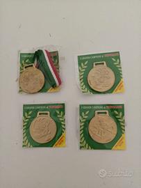 n.,4 medaglie gadget di topolino nuove e sigillate