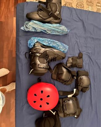 Pattini a uno con protezioni e casco
