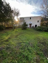 Casa con terreno edificabile