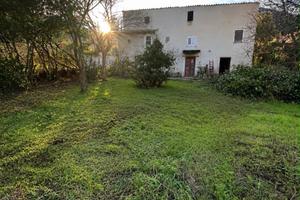 Casa con terreno edificabile