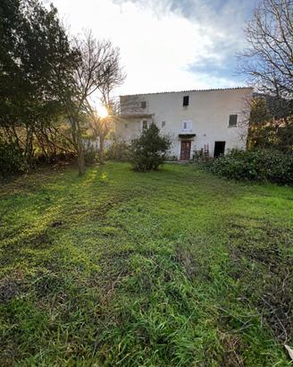 Casa con terreno edificabile