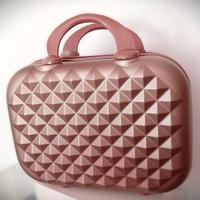 Beauty-case rigido.