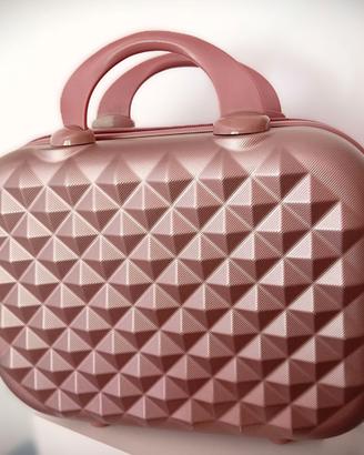 Beauty-case rigido.