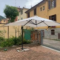 Ombrellone decentrato