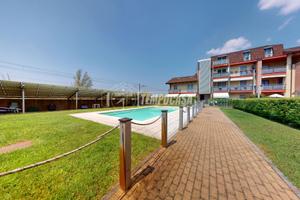 QUADRILOCALE ALL'ULTIMO PIANO CON PISCINA CONDOMIN