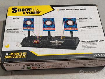 Spara a un bersaglio giocattoli bambini con foglio