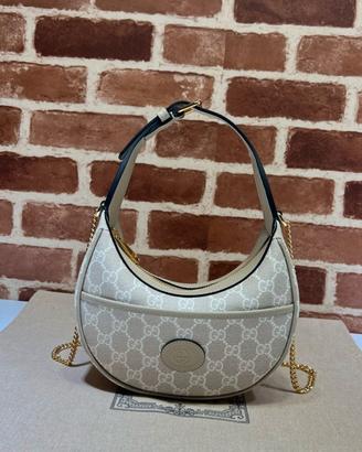 Borsa a mezzaluna Gucci