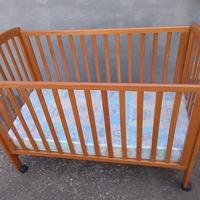 culla in legno ciliegio come nuova