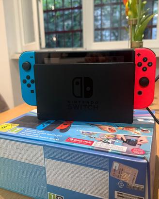 Nintendo Switch + Mario Kart 8 Deluxe + Wii Sport